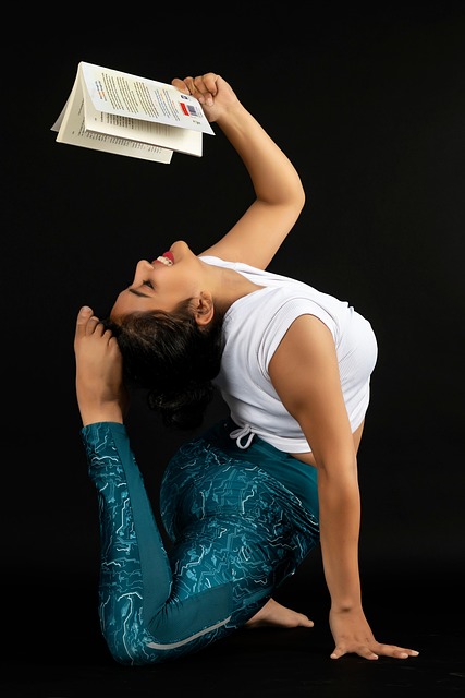 person practicing stretching flexibility mobility yoga mat educational setting
